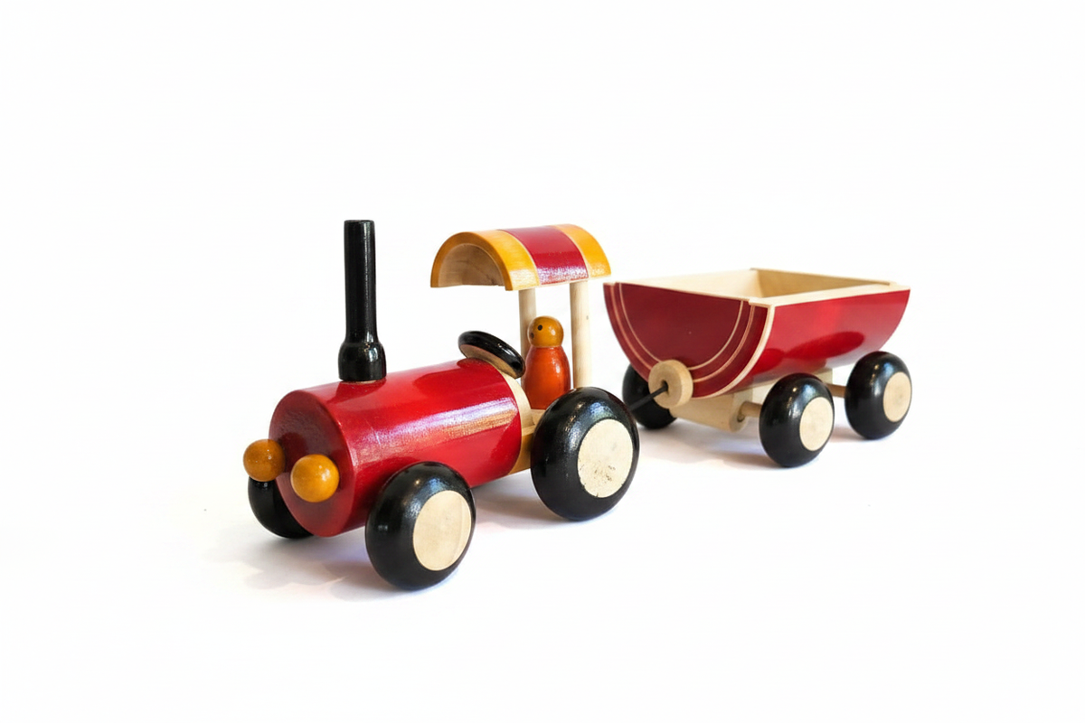 Wooden toy tractor with trailer styled product photo