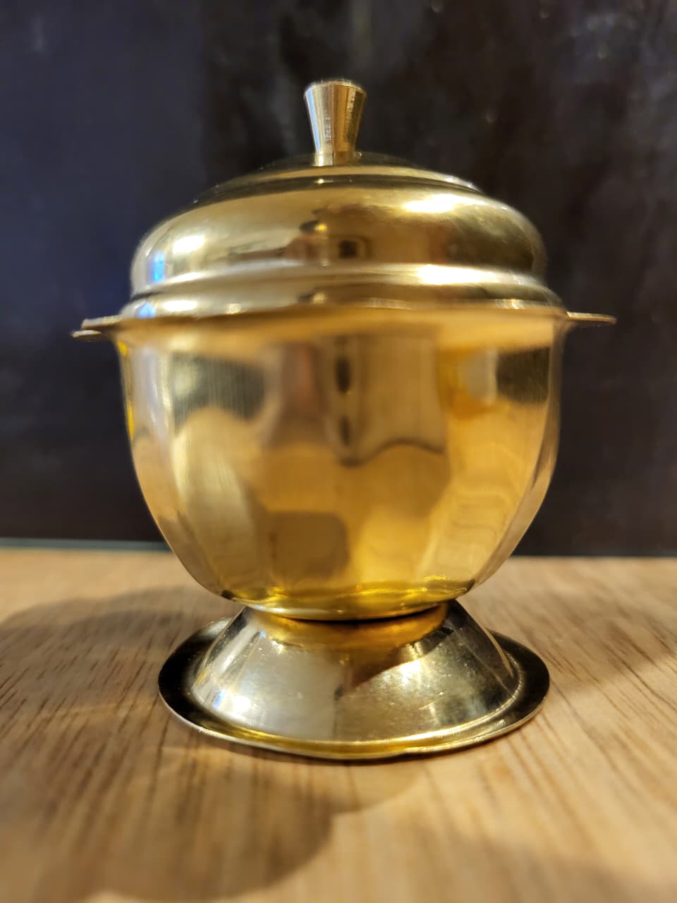 Kumkuma Bharani brass kumkum box three-quarter view