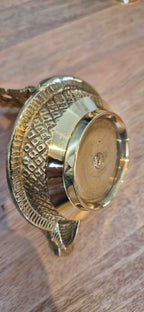 Lakshmi diya brass oil lamp engraved rim bottom view