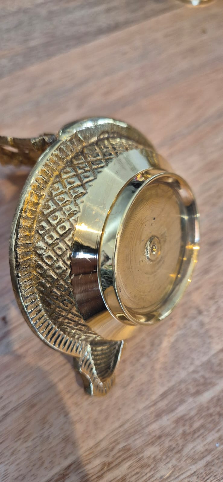 Lakshmi diya brass oil lamp engraved rim bottom view