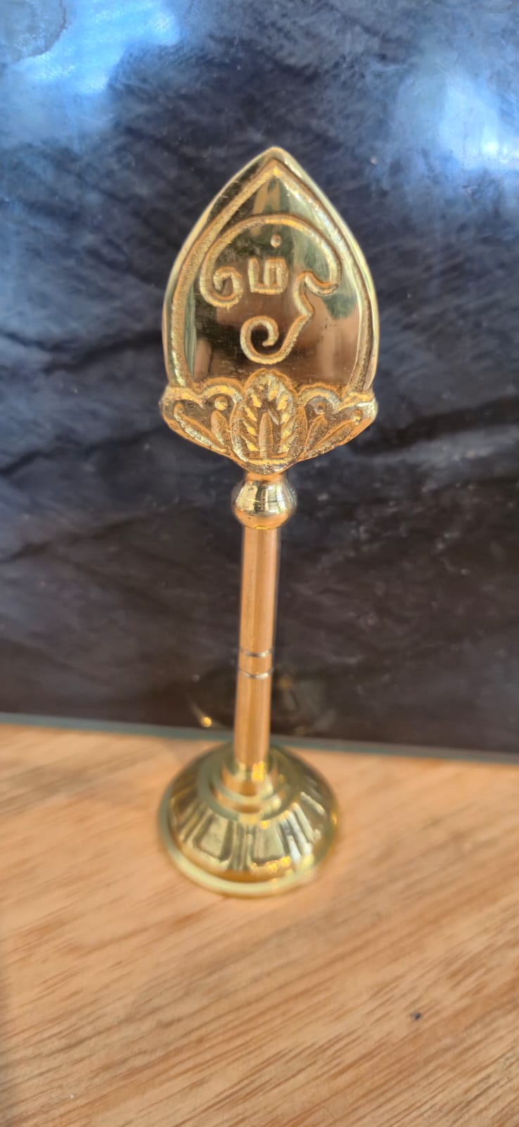 Murugan Vel brass figurine close-up