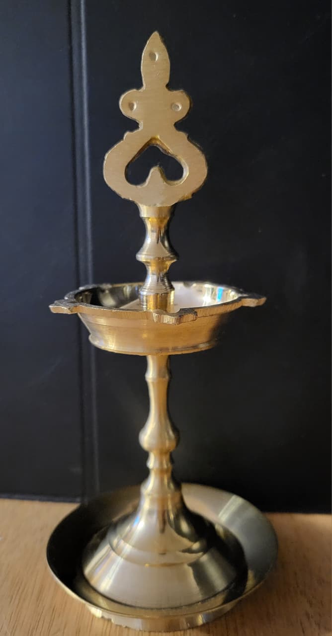Kuthu Vilakku small brass standing oil lamp side view