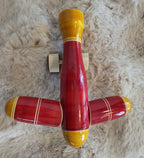 Channapatna wooden toy aeroplane overhead flat lay view
