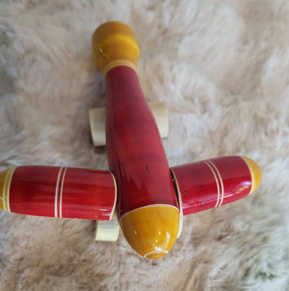 Channapatna wooden toy aeroplane top-down view showing wing layout