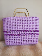 Handwoven lavender basket bag front view with gold geometric handle