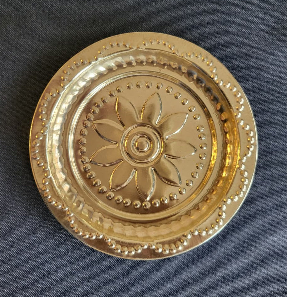 Brass puja thali with lotus engraving – top view