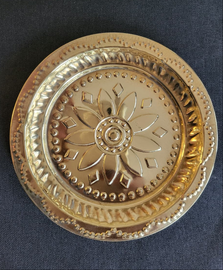 Brass puja thali with diamond motifs – angled view
