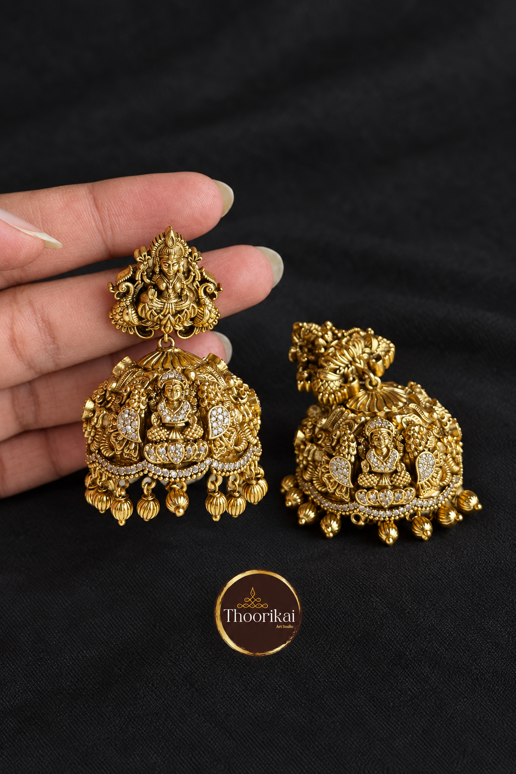 Antique Lakshmi with Peacock Jhumka on charcoal