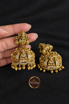 Antique Lakshmi with Peacock Jhumka on charcoal