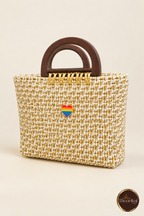 Angled front perspective of white-gold mini handbag