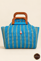 Front view of peacock blue-gold handwoven handbag with wooden handles