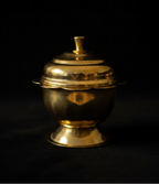 Kumkuma Bharani brass box on black background