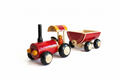Wooden toy tractor with trailer styled product photo