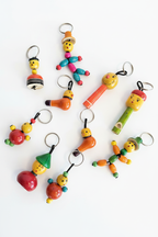 Channapatna wooden keychain assortment styled product photo