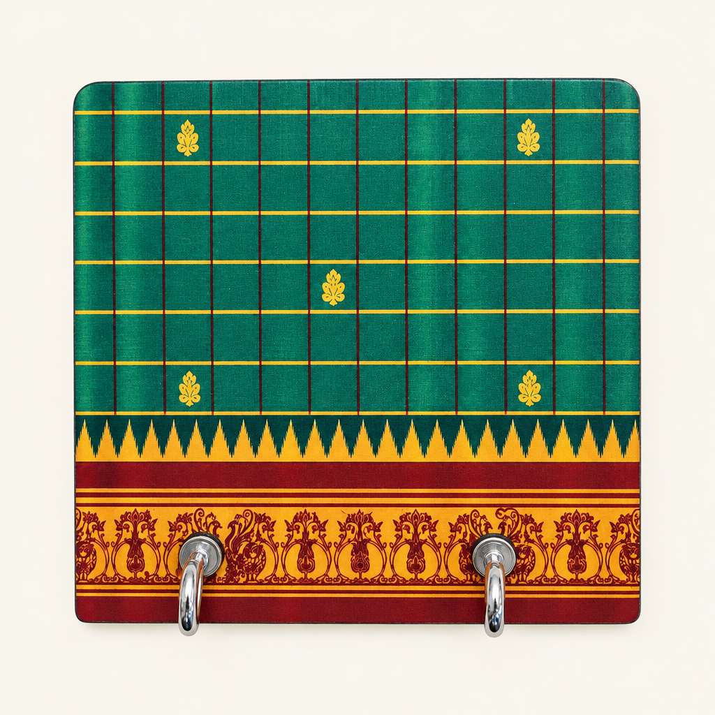 Green grid key holder with gold motifs and ornamental border
