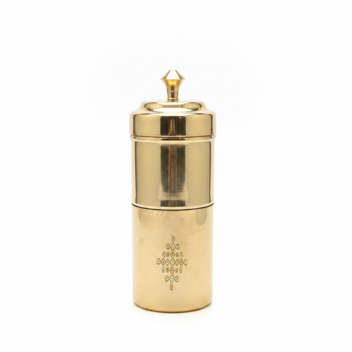 Handcrafted brass filter coffee maker on white background