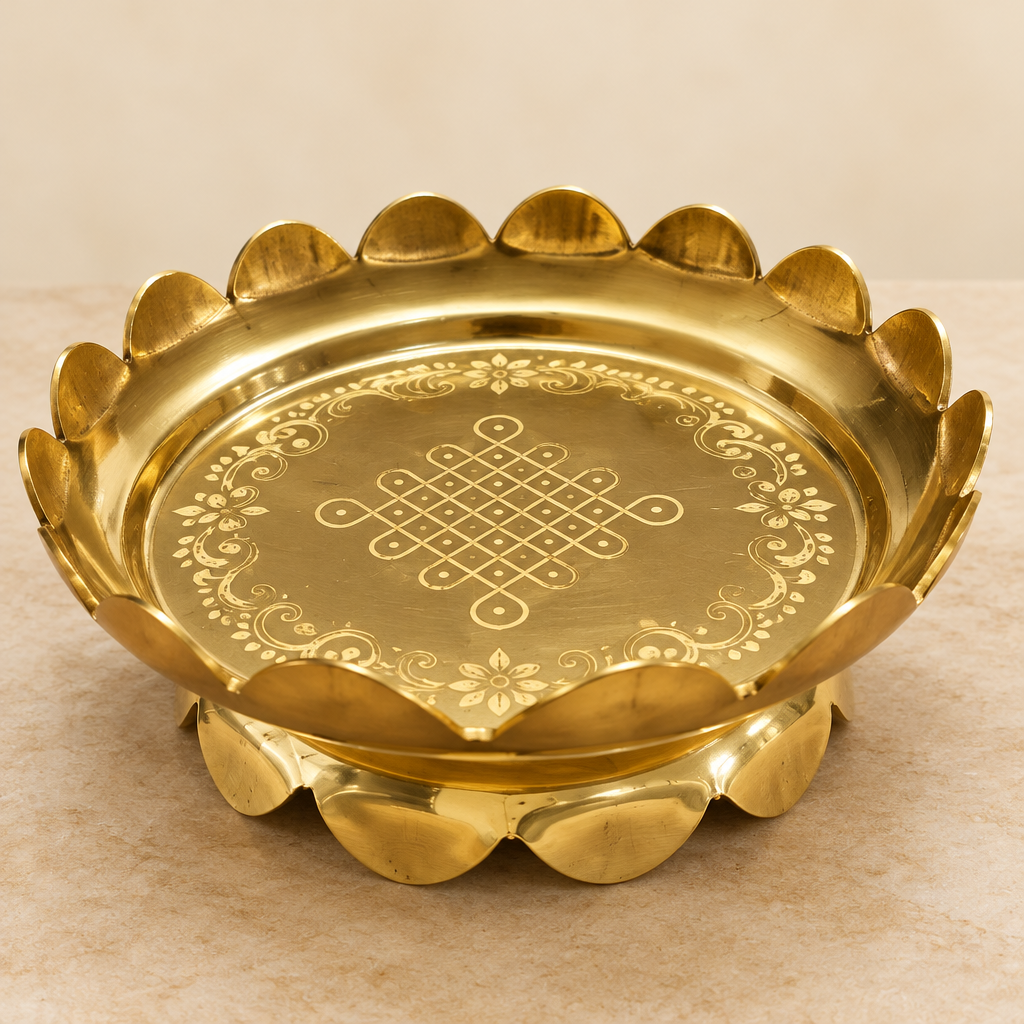 Three-quarter view of brass lotus uruli on pale stone
