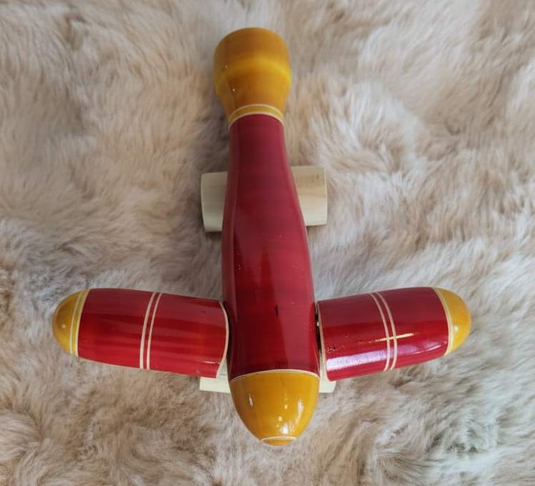 Channapatna wooden aeroplane flat lay lifestyle photo