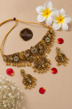Necklace and earrings with Studio Thoorikai logo